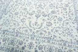 Close-up detail of New Nain rug from Iran / Persia showing Wool weave