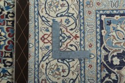 Backside of handmade 2000s Nain rug showing knot structure and weave density