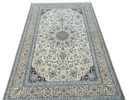 Surface texture of 2000s Nain rug with natural Cork and intricate pattern
