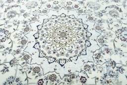 Central medallion detail of 2000s Nain rug from Iran / Persia