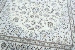 Close-up detail of 2000s Nain rug from Iran / Persia showing Wool weave