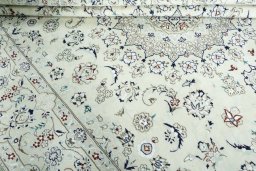 Close-up detail of 2000s Nain rug from Iran / Persia showing Wool weave