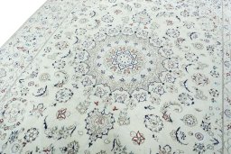 Backside of handmade 2000s Nain rug showing knot structure and weave density