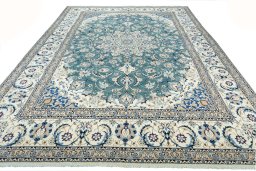 Surface texture of 2000s Nain rug with natural Wool and intricate pattern