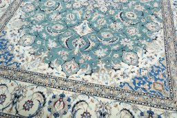 Close-up detail of 2000s Nain rug from Iran / Persia showing Wool weave