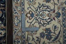 Close-up detail of 2000s Nain rug from Iran / Persia showing Wool weave