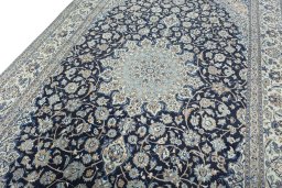 Close-up detail of 2000s Nain rug from Iran / Persia showing Wool weave