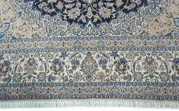Central medallion detail of 2000s Nain rug from Iran / Persia