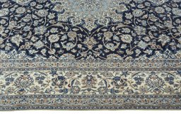 Close-up detail of 2000s Nain rug from Iran / Persia showing Wool weave