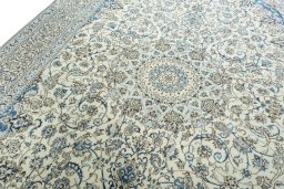 Backside of handmade 2000s Nain rug showing knot structure and weave density