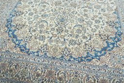 Close-up detail of 2000s Nain rug from Iran / Persia showing Wool weave