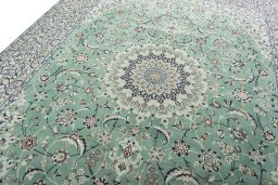 Backside of handmade 2000s Nain rug showing knot structure and weave density