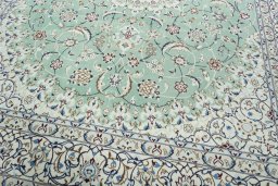 Close-up detail of 2000s Nain rug from Iran / Persia showing Wool weave