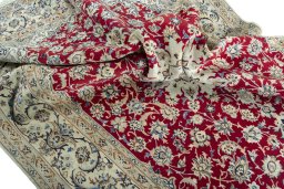 Surface texture of 2000s Nain rug with natural Wool and intricate pattern