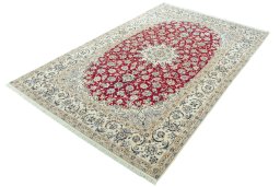 Corner detail of 2000s Nain rug showing border pattern and Wool pile