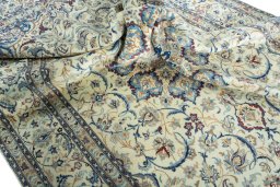Surface texture of 2000s Nain rug with natural Wool and intricate pattern