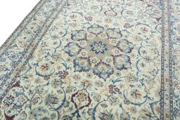 Backside of handmade 2000s Nain rug showing knot structure and weave density