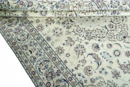 Close-up detail of 2000s Nain rug from Iran / Persia showing Wool weave