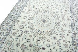 Backside of handmade 2000s Nain rug showing knot structure and weave density