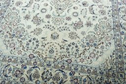 Close-up detail of 2000s Nain rug from Iran / Persia showing Wool weave