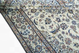 Close-up detail of 2000s Nain rug from Iran / Persia showing Wool weave