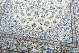 Close-up detail of 2000s Nain rug from Iran / Persia showing Wool weave