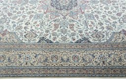 Corner detail of 2000s Nain rug showing border pattern and Cork pile