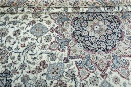 Close-up detail of 2000s Nain rug from Iran / Persia showing Cork weave