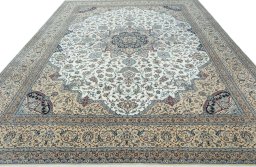 Surface texture of 2000s Nain rug with natural Cork and intricate pattern