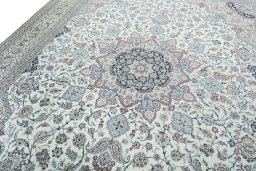 Backside of handmade 2000s Nain rug showing knot structure and weave density