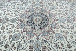 Central medallion detail of 2000s Nain rug from Iran / Persia