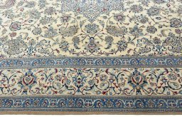 Corner detail of 2000s Nain rug showing border pattern and Wool pile