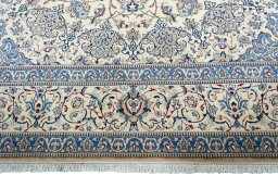 Full view of 2000s Nain rug from Iran / Persia, 441 × 317 cm in Beige tones
