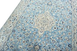 Backside of handmade 2000s Nain rug showing knot structure and weave density