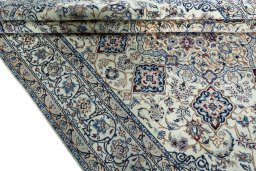 Close-up detail of New Nain rug from Iran / Persia showing Wool weave