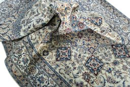 Surface texture of New Nain rug with natural Wool and intricate pattern