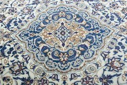 Central medallion detail of 2000s Nain rug from Iran / Persia