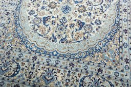 Close-up detail of 2000s Nain rug from Iran / Persia showing Wool weave
