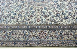 Corner detail of New Nain rug showing border pattern and Wool pile