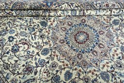 Close-up detail of New Nain rug from Iran / Persia showing Wool weave