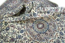 Surface texture of New Nain rug with natural Wool and intricate pattern