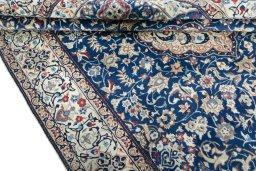 Close-up detail of 2000s Nain rug from Iran / Persia showing Wool weave