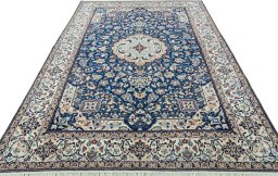 Surface texture of 2000s Nain rug with natural Wool and intricate pattern