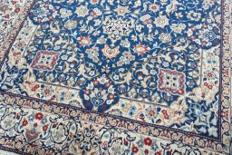 Close-up detail of 2000s Nain rug from Iran / Persia showing Wool weave