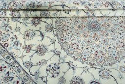 Close-up detail of 2000s Nain rug from Iran / Persia showing Wool weave