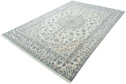 Corner detail of 2000s Nain rug showing border pattern and Wool pile