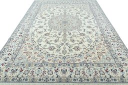 Surface texture of 2000s Nain rug with natural Wool and intricate pattern