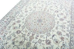 Backside of handmade 2000s Nain rug showing knot structure and weave density