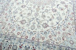 Close-up detail of 2000s Nain rug from Iran / Persia showing Wool weave