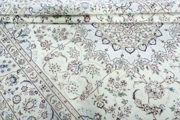 Close-up detail of 2000s Nain rug from Iran / Persia showing Wool weave